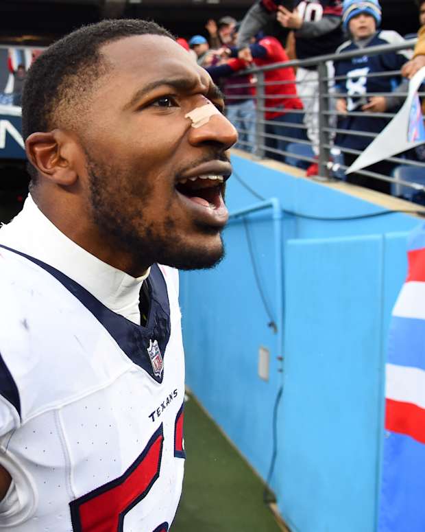 Dec 17, 2023; Nashville, Tennessee, USA; Houston Texans defensive end Jonathan Greenard (52) celebrates after a victory against the Tennessee Titans at Nissan Stadium.